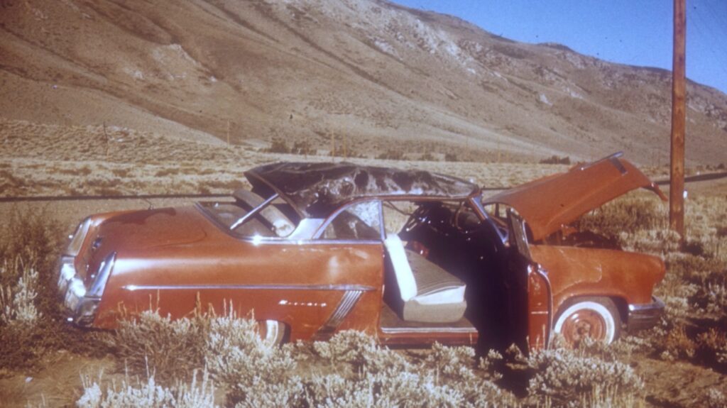 A red car that has been in an accident