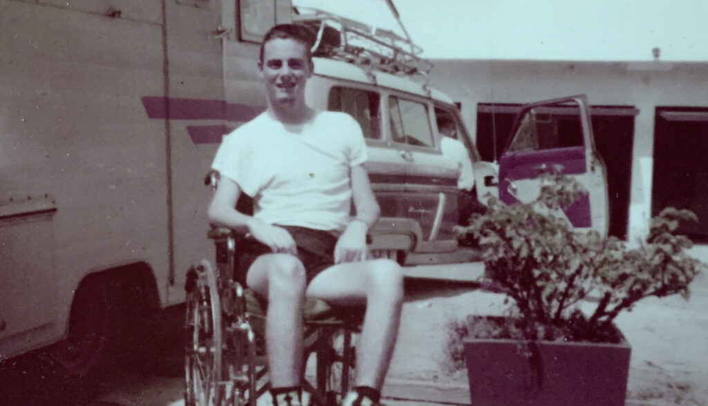 Gale Williams in his wheelchair, age 27. 