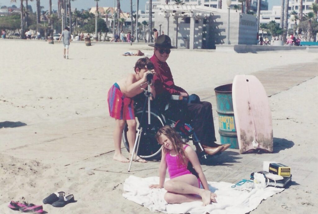 Gale and his two children are at the beach in Santa Monica
