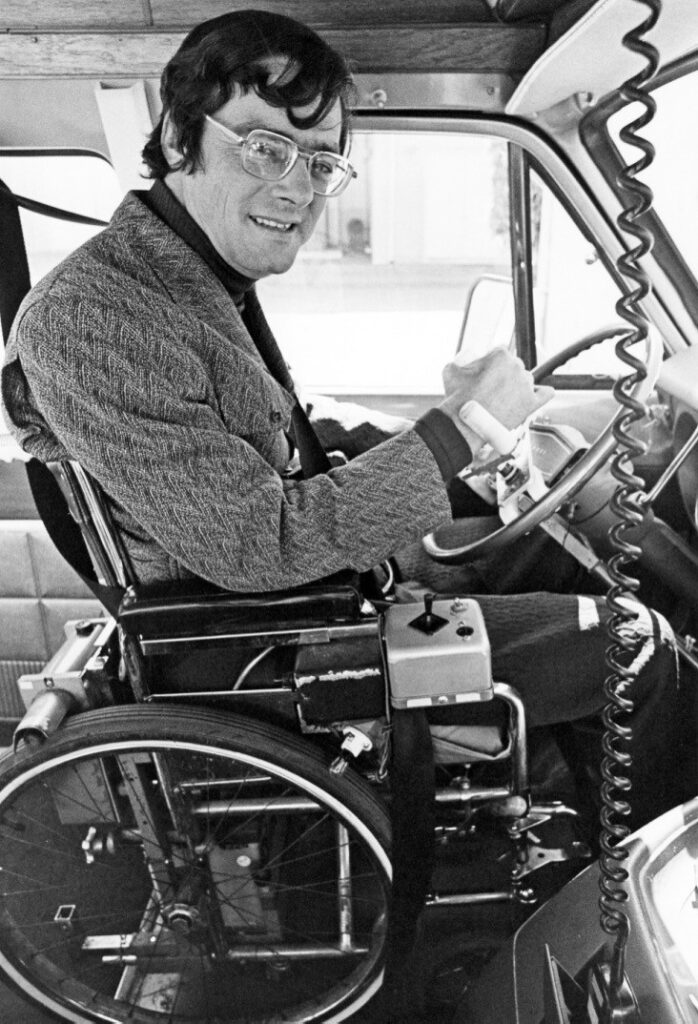 Gale in his wheelchair, driving his van